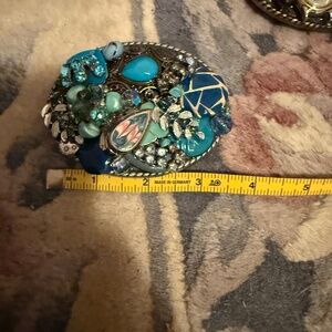 Mood indigo belt buckle 3 1/2 x 2 1/2 fits onto 1 1/2 belt you supply yourself